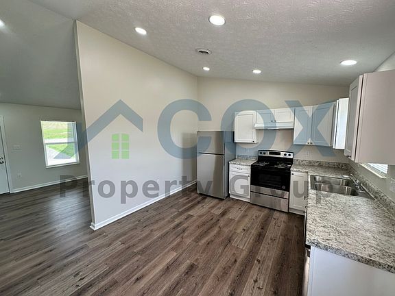 Beautiful kitchen with new cabinets and countertops.