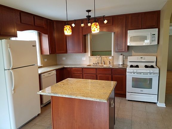 4th image of 11459 S Natoma Ave