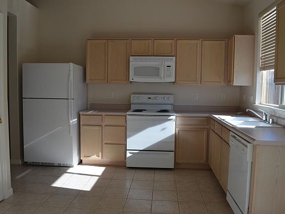 Kitchen with Title Floors, Refrigerator