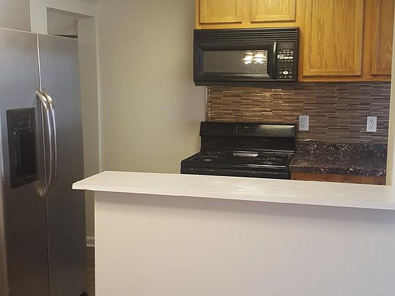 Kitchen with half wall