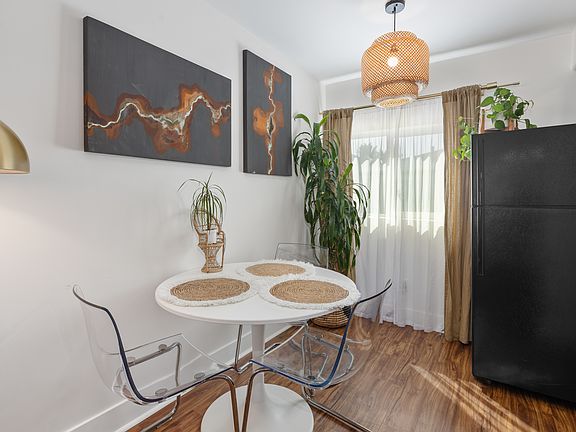 Dining area fits a breakfast table comfortably and is bathed in natural light from the south east facing windows.