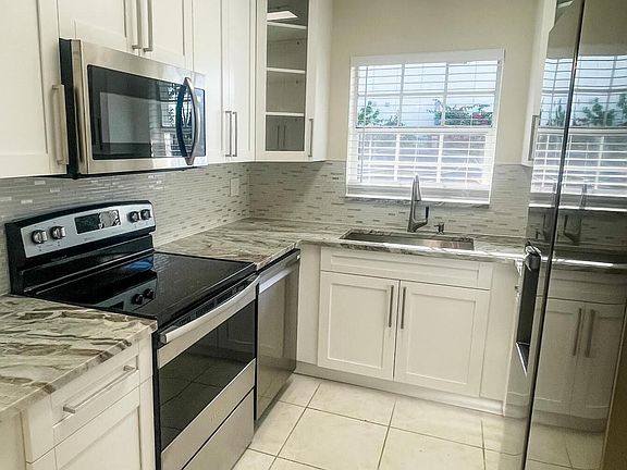 4th image of 10295 Boynton Place Cir