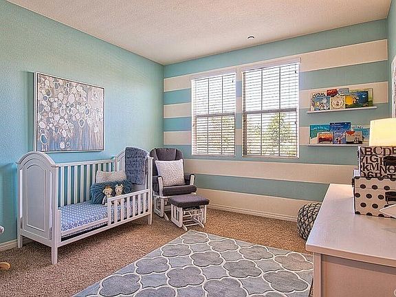 The entire 2nd bedroom has been repainted in the downstairs neutral color.