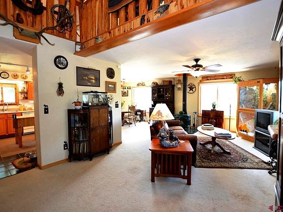 Main entry at front of house leading to living room, kitchen and upstairs.