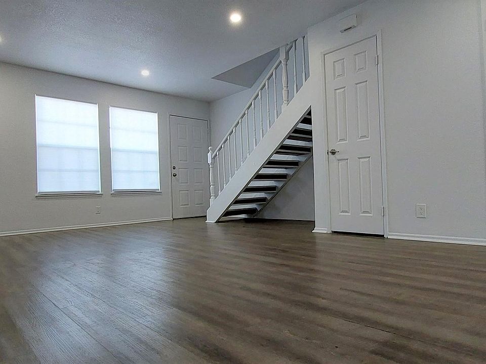 LIVING ROOM: Large & spacious with LED Lighting, Guest Closet & Guest Half-Bathroom