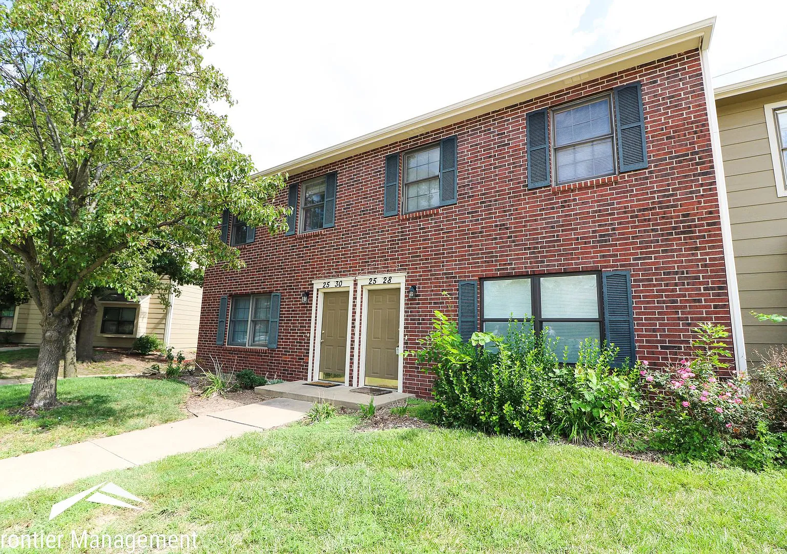 Spacious Brick Condo in a Great Location! — Photo 1