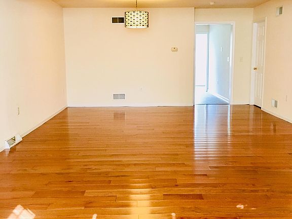 Sprawling 1st Floor Brand New Hardwood Floors - Living Room