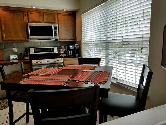 Beautiful natural light kitchen overlooking garage and main entrance