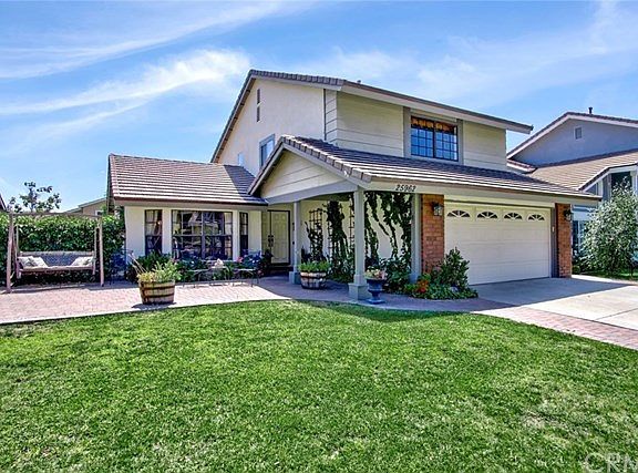 Another view of the front of the home with a large front patio
