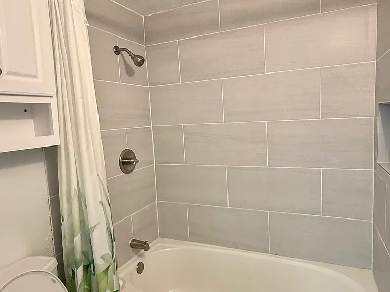 Upstairs shower and tub