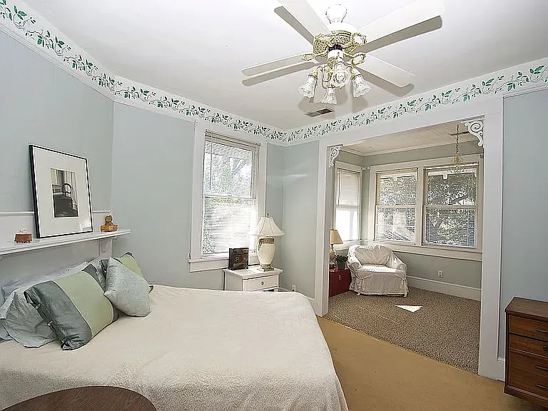 Upstairs back BR is very large with sitting area.