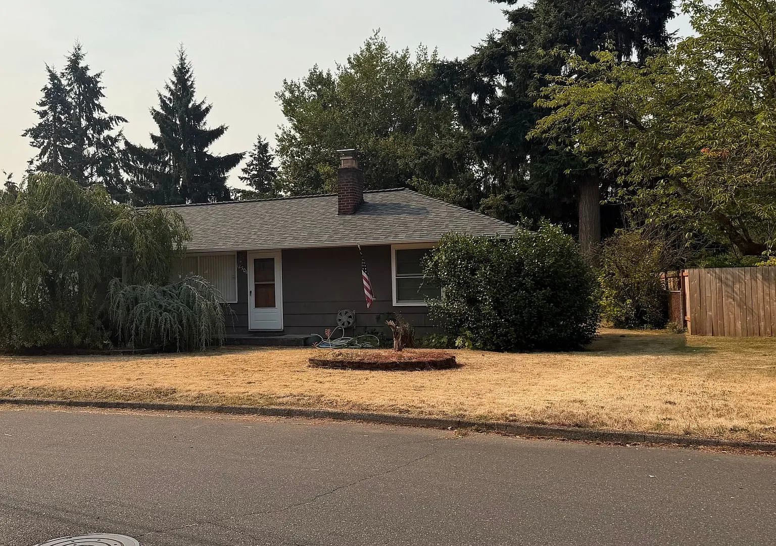 Cozy Home Set in Established Community — Photo 1