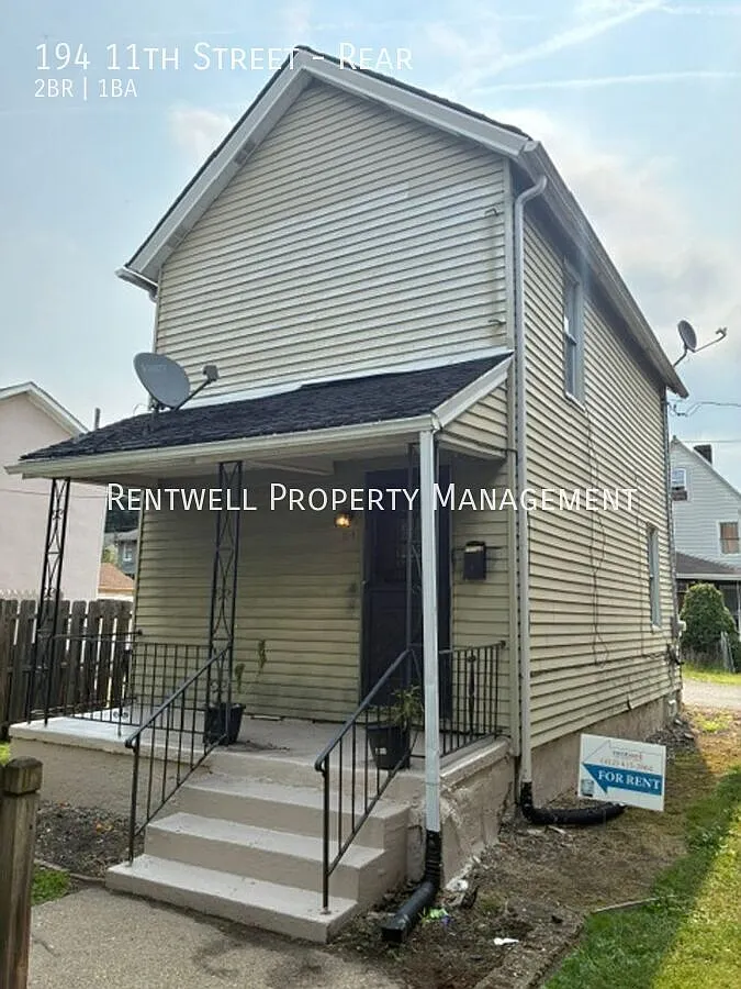 2-Bedroom Single-Family Home with Shared Yard — Photo 1