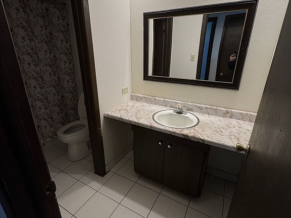 Sink separate from shower and toilet