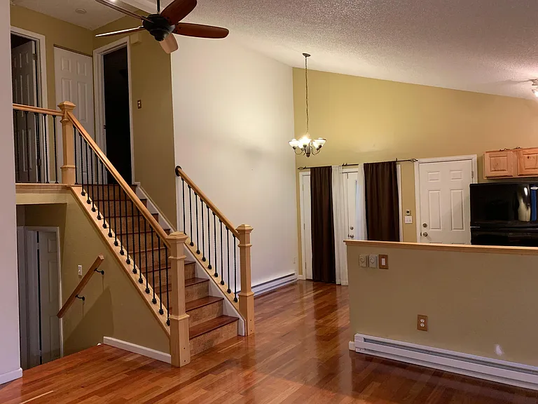 Two bedrooms and full bathroom with tub upstairs, master with on suite full bathroom and additional bedroom downstairs, French doors open out onto the patio, walk in from the attached garage