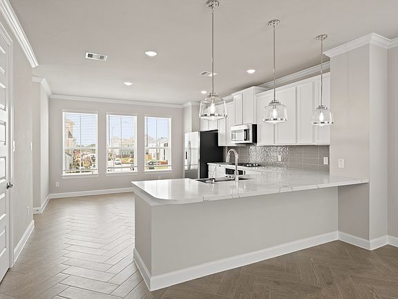 Kitchen with pendant lighting