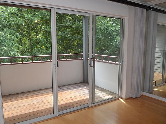 Peaceful balcony with view of woods