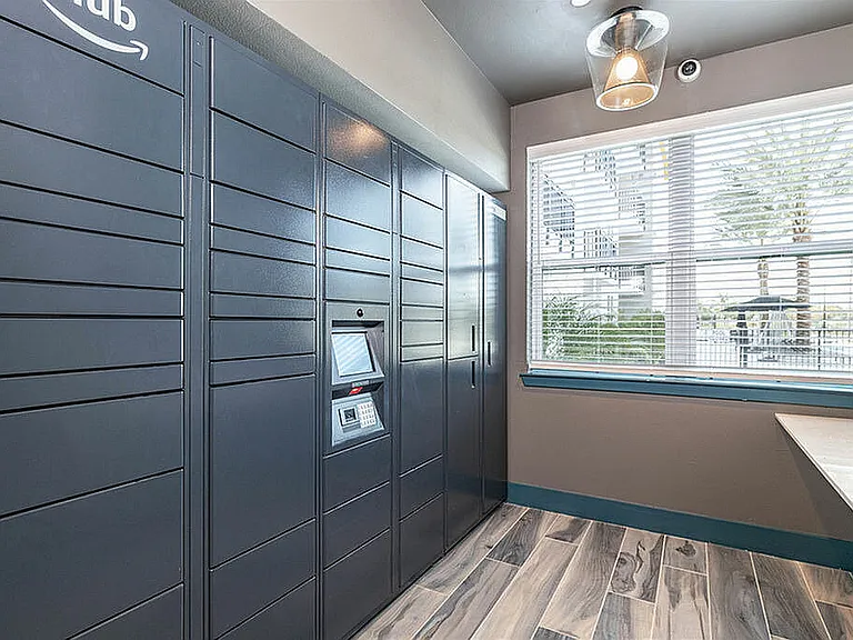 Experience convenience with our state-of-the-art package room featuring secure storage solutions.