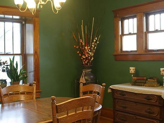 Lots of natural light!
						:
						Dining room pulls light from large windows on two sides and adjoining kitchen.