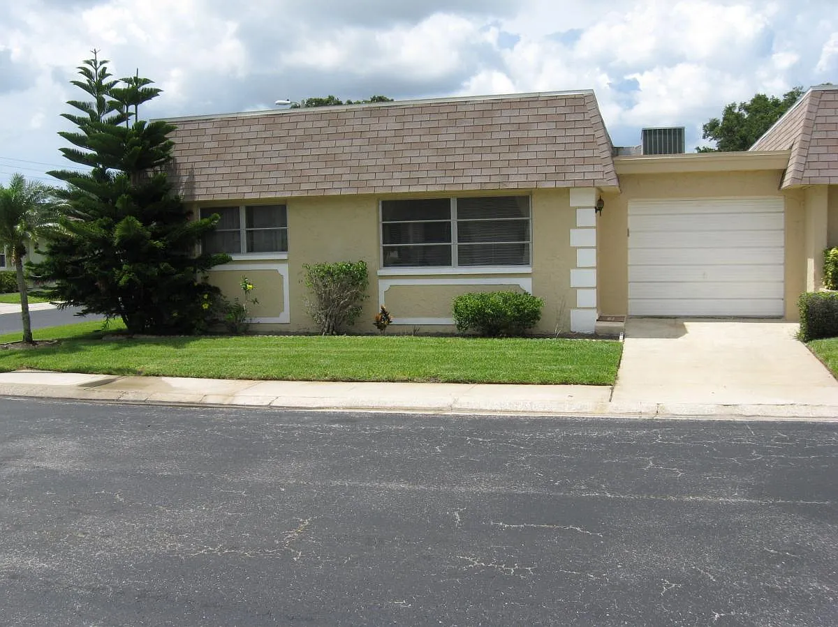 Front of Exterior - 7077 Versailles N