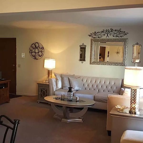 Generously sized living room (13' x 16') offering a comfortable and open layout.