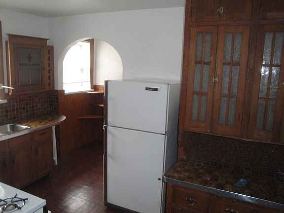 Kitchen - dishwasher added and fridge and stove replaced.