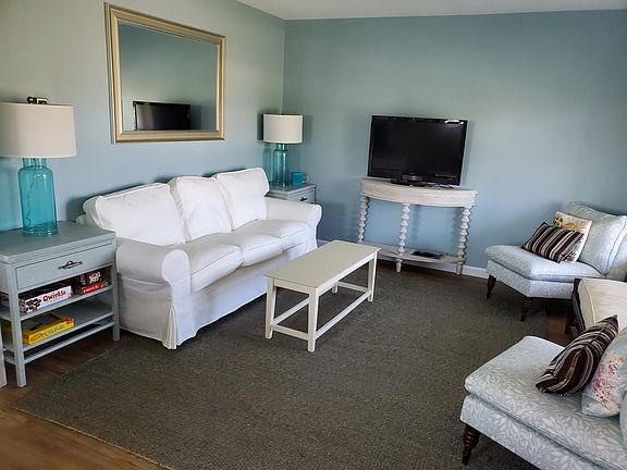 Open plan living area with view of cove