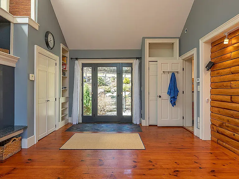 1st floor bedroom with door to backyard