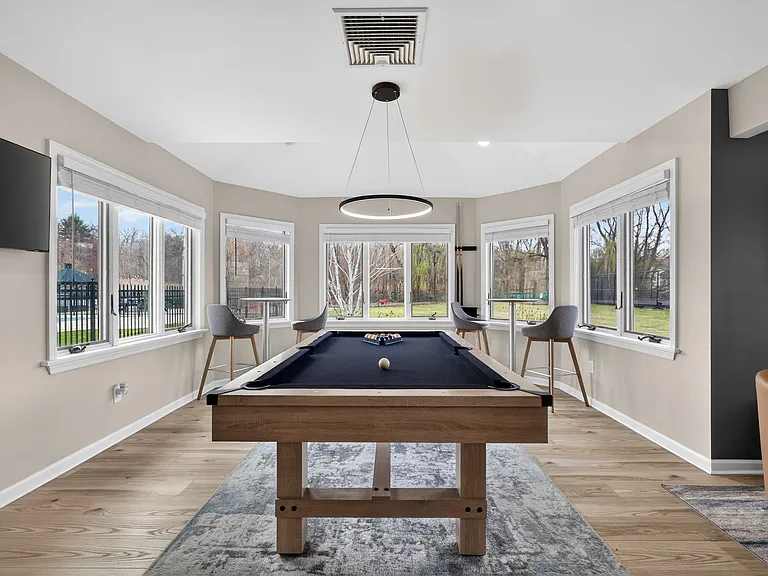 Welcome to Eagle Rock Apartments at Mohegan Lake, where modern amenities meet serene surroundings. Enjoy our stylish game room featuring natural light and beautiful views. Elevate your lifestyle todayschedule a tour!