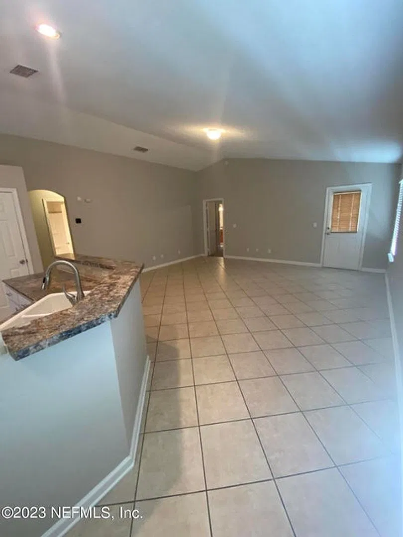 Home with Open Floorplan — Photo 3