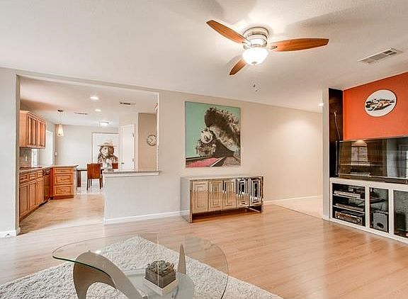 View from living room showing how open the kitchen is.