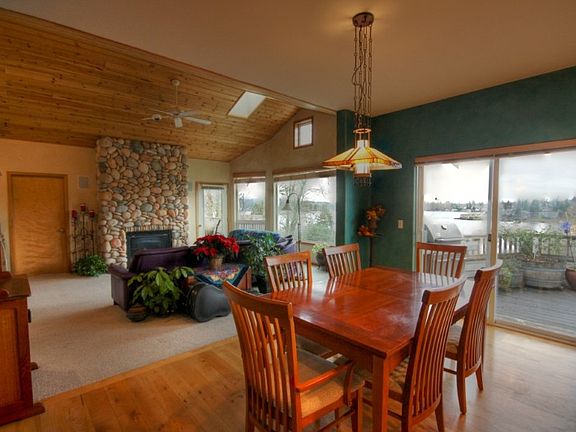 Open Floor plan flows from kitchen, dining into living area.