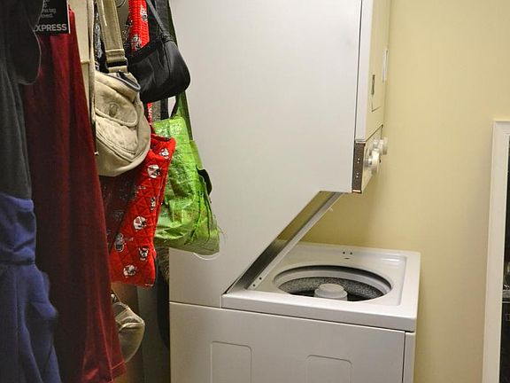 Stack washer/dryer in walk in closet