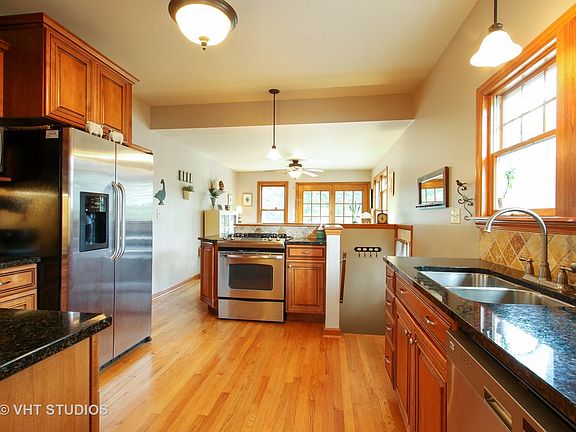 Kitchen has many updates including Granite Countertops, Beautiful Cabinets and all Stainless Steel Appliances.