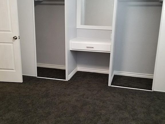 Master Bedroom His & Her Closets / Vanity