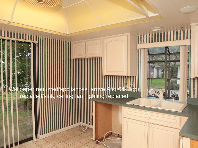 Kitchen Appliances on the way. Wallpaper removed and painted, floor replaced