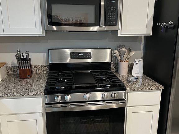 Gas stove and overhead microwave