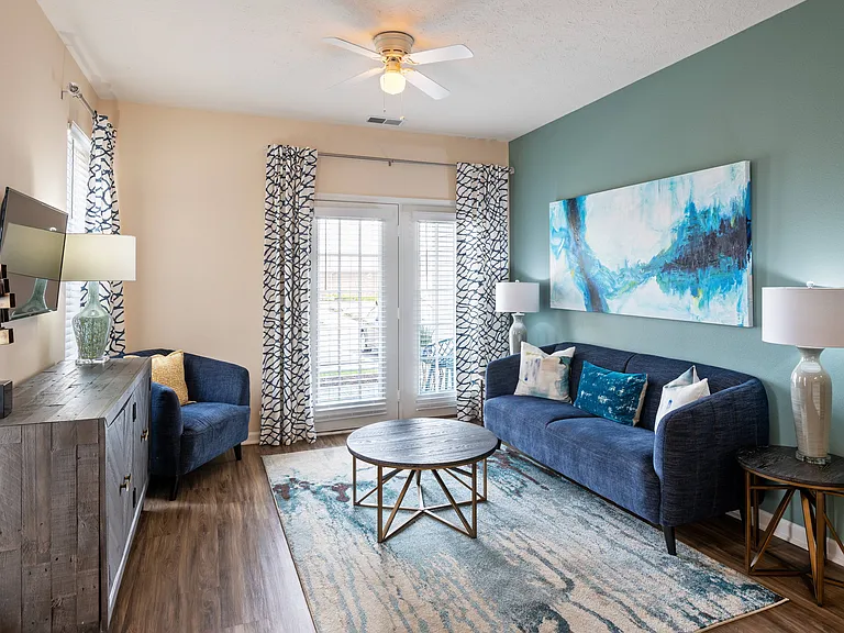 Spacious Living Room with Hardwood-Style Flooring