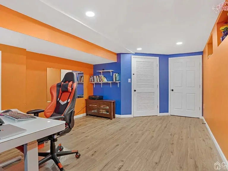 Finished basement with recessed lighting