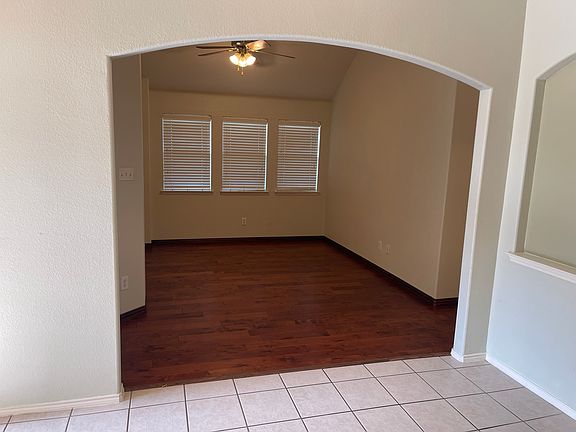 Kids playroom, office, or formal dining room.