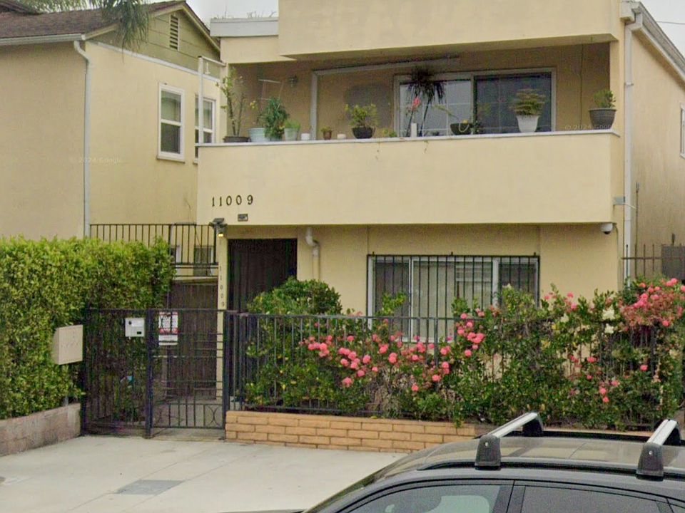 Google Street View, updated 06/2024. Mailboxes out front with video intercom. Fully gated in front.