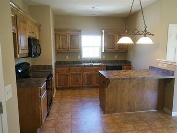 4th image of 2414 N 114th Ter