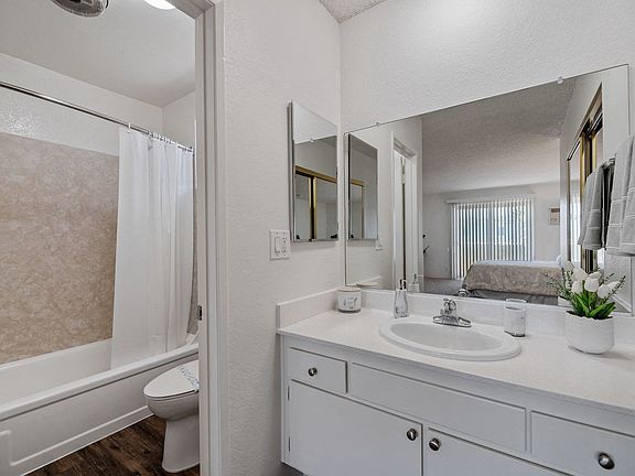 Spacious Bathroom at the Terrace apartment in Tarzana, CA with upgraded vanity and mirrored closet