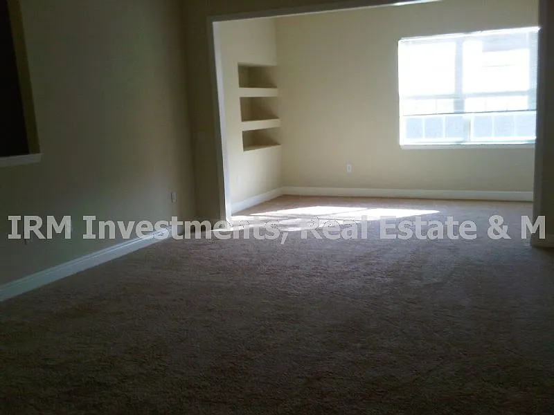 Building Photo - 1300 Eastern Pecan Pl #203
