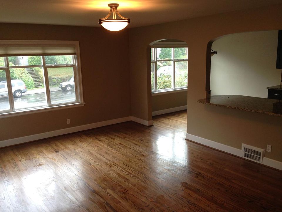 living, dining and kitchen bar