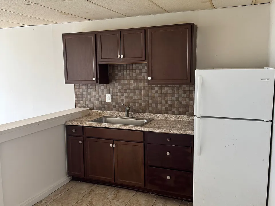 Kitchen with appliance