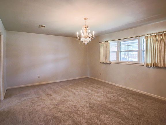 Formal dining room that can also be used as a den/second living area.