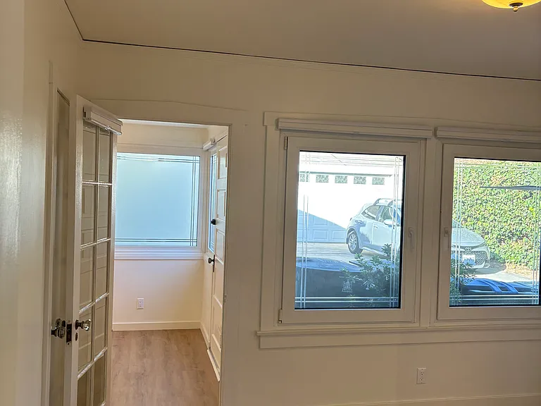 2nd bedroom, looking to 3rd room (den, office, etc.)