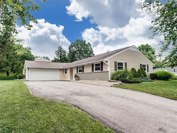 Lots of parking space + 2 car garage with storage