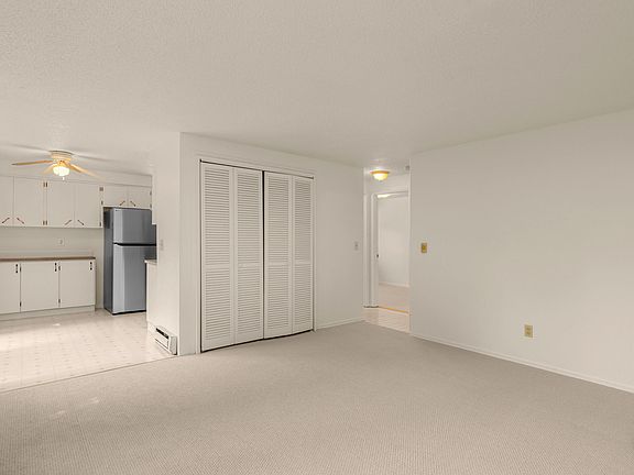 Living Room -- laundry and storage in closet